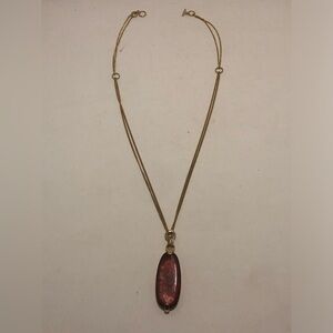 Elegant Gold Tone Necklace with Purple-Red Pendant
